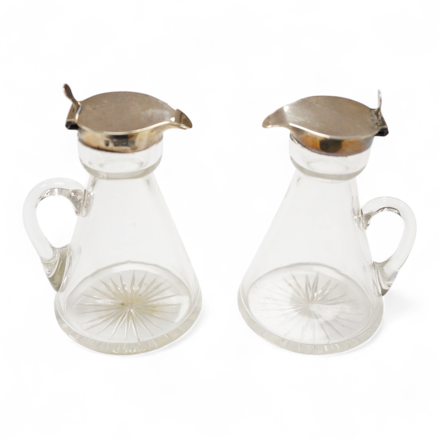 A pair of Edwardian silver mounted glass whisky noggins, by J & J Maxfield Ltd, Birmingham, 1906, height 10.6cm.